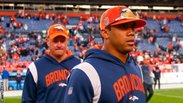 Russell Wilson on the field for the Denver Broncos