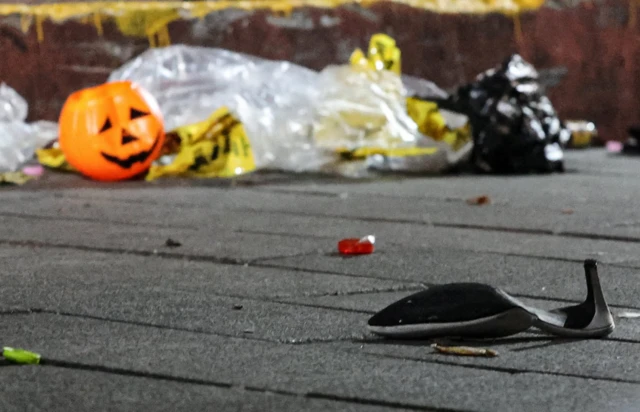 High heel and a plastic pumpkin at the scene of a stampede in Seoul