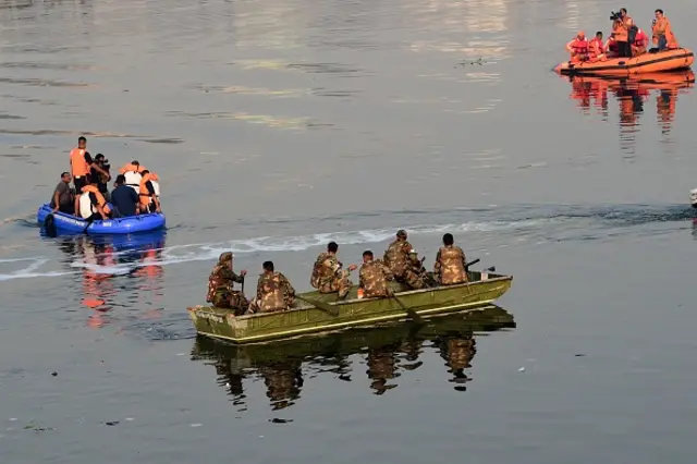 Search boats seen in the Machchhu river