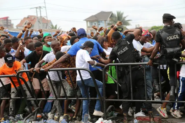 People arrive to attend the concert of the Congolese singer Fally Ipupa