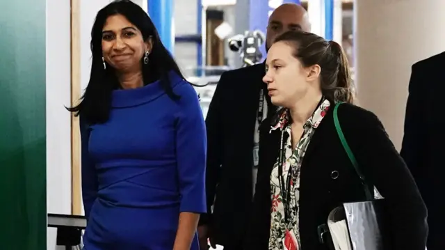 Suella Braverman wears a blue dress on Day Three of the Tory party conference