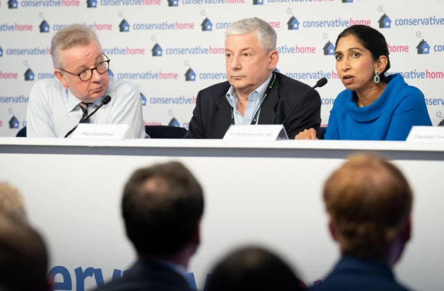 Michael Gove, Paul Goodman and Home Secretary Suella Braverman during the Conservative Party conference