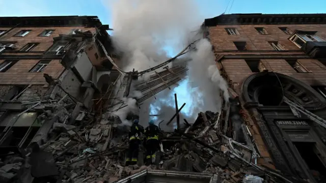 Smouldering ruins of a residential building in Zaporizhzhia