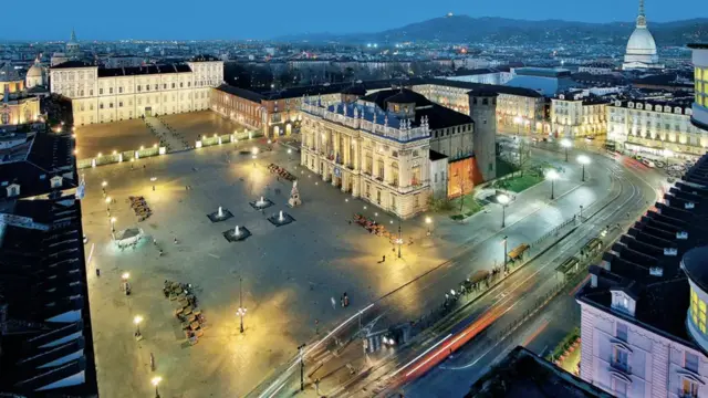 A nighttime aerial view of the Italian city Turin