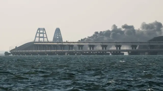 Smoke rises from fire on the Kerch bridge in the Kerch Strait, Crimea