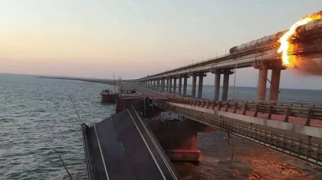 Photo made available by the Ukraine Security Service shows a collapsed part of the Kerch Strait bridge in Crimea