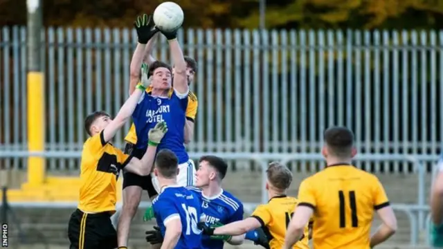 Gaelic footballers in action during a match