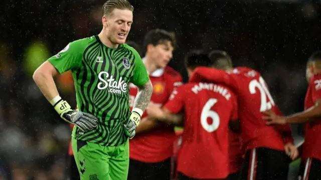 Jordan Pickford reacts to the result.