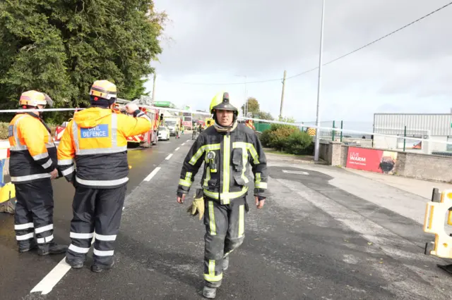 Firefighter leaves cordon area in Creeslough