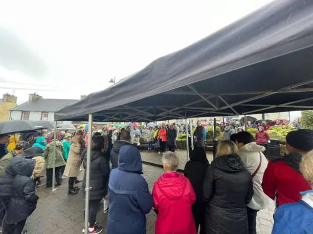 People gathered for a vigil in Milford town centre