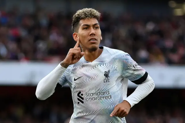 Roberto Firmino celebrates his goal