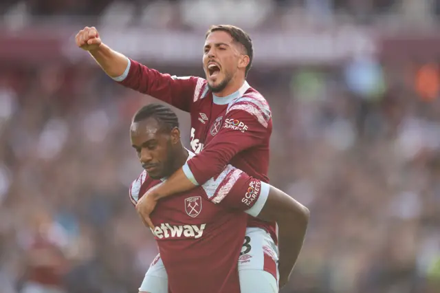 Michail Antonio celebrates with Pablo Fornals after scoring their team's third goal