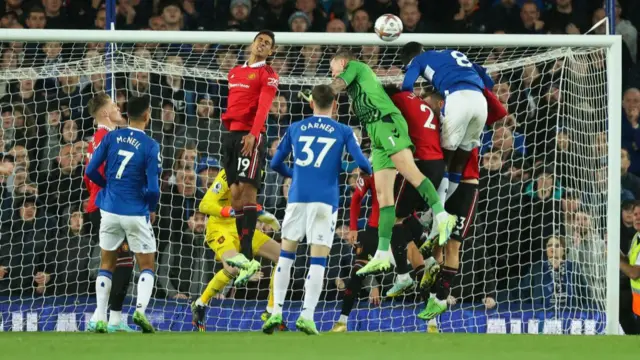 Jordan Pickford nearly scores a header.