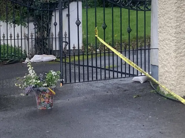 Flower tributes being laid