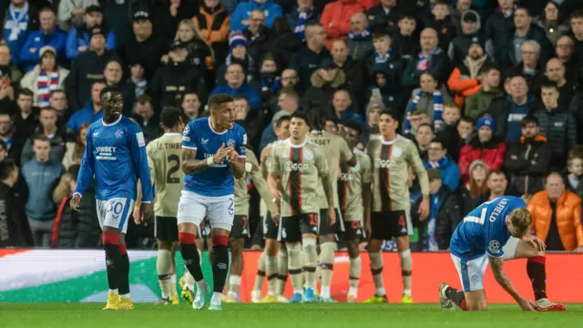 James Tavernier tries to gee up his team-mates after Ajax score