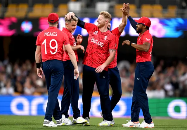 England and Sam Curran celebrate a wicket