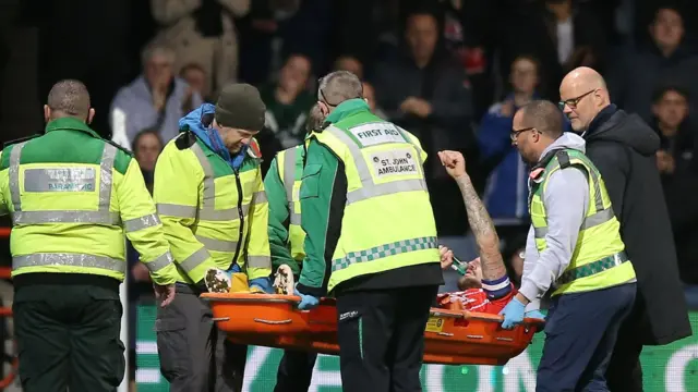 Sonny Bradley stretchered off