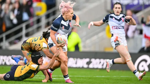 Amy Hardcastle tackled by Brazil