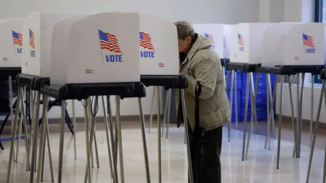 Voters line up for early voting at the Clinton Rose Senior Center in Milwaukee, Wisconsin, USA, 25 October 2022