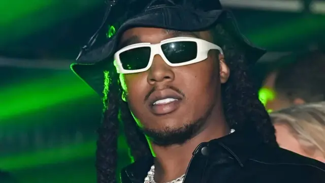 Takeoff wearing sunglasses