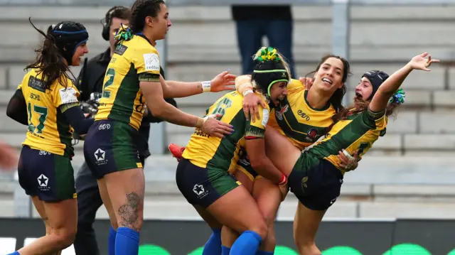 Brazil celebrate their first World Cup try