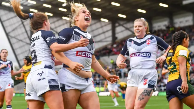 England celebrate a try against Brazil