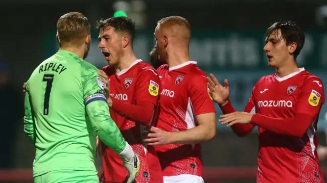 Morecambe celebrate penalty save