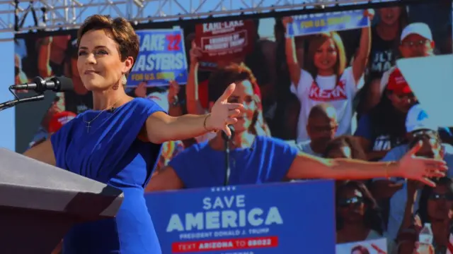 Republican candidate for Governor of Arizona Kari Lake, endorsed by former U.S. President Donald Trump, speaks on stage, before a rally ahead of the midterm elections in Mesa, Arizona, U.S., October 9, 202