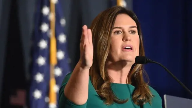 Former Trump spokeswoman Sarah Huckabee Sanders delivering a speech