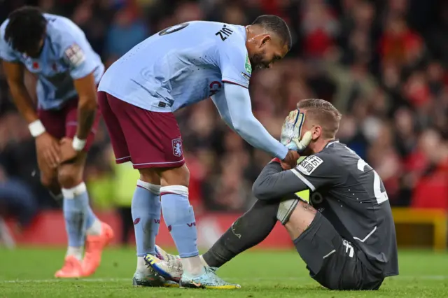 Robin Olsen and Douglas Luiz