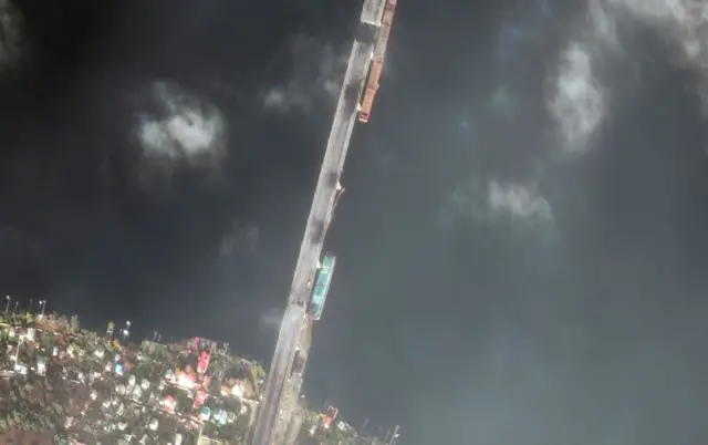 A satellite image shows view of southern span of damaged Antonivskiy bridge in Kherson