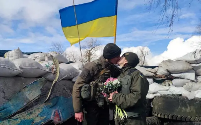 Ukrainian newlyweds in National Guard, 8 Mar 22