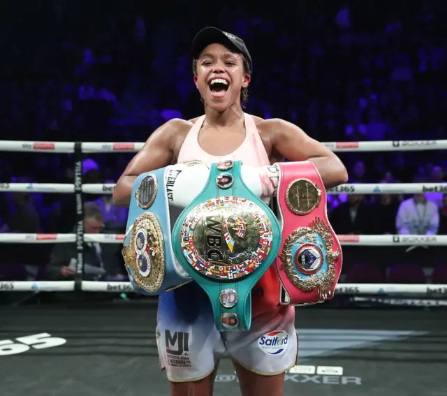 Natasha Jonas with her three world title belts.