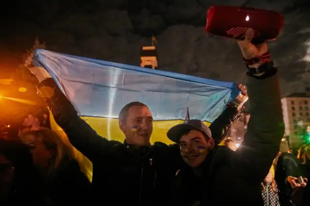 Ukrainians celebrate the liberation of Kherson in Kyiv's central Maidan Square