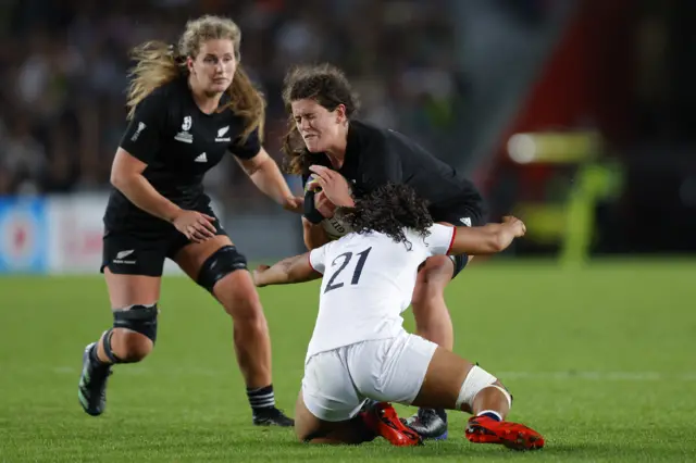 Chelsea Bremner of New Zealand is tackled