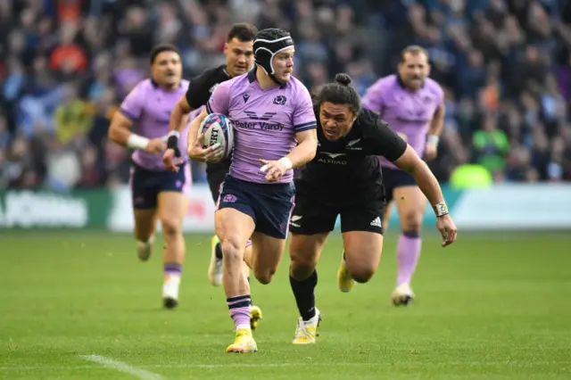 Darcy Graham races away to score Scotland's second try