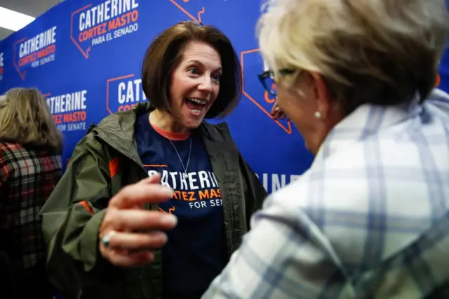 Democratic Senator from Nevada Catherine Cortez Masto (L) greets an attendee during a canvass kickoff event in Henderson, Nevada, USA, 07 November 2022.