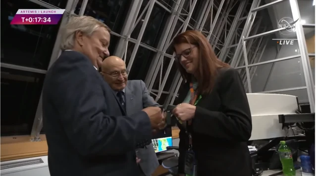 Nasa flight director Charlie Blackwell-Thompson has her tie cut by a colleague