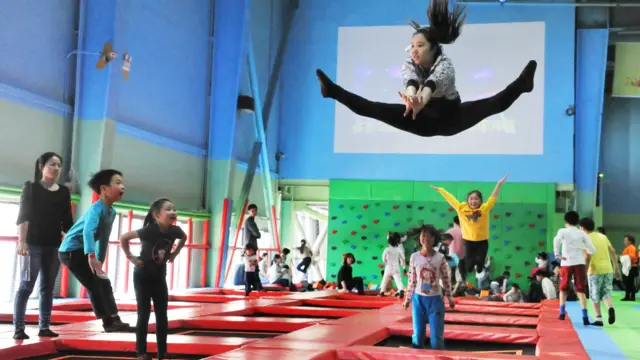 Children at a trampoline park