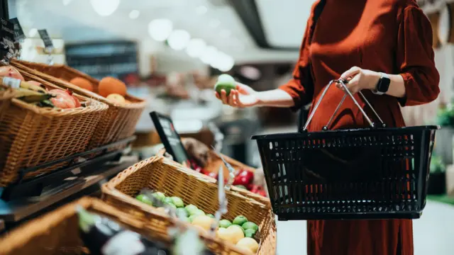 Woman shopping at supermarket