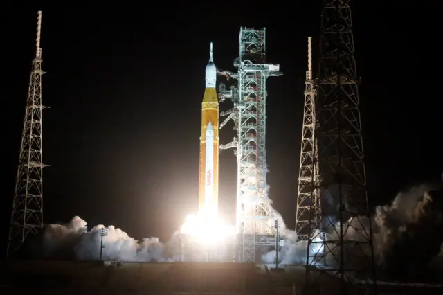 NASA's next-generation moon rocket, the Space Launch System rocket blasts off