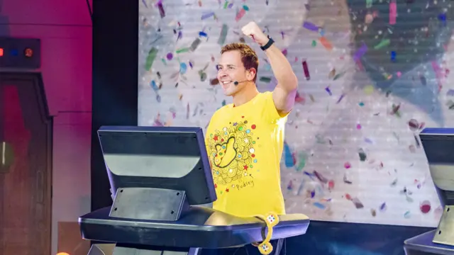 Scott celebrating the new total