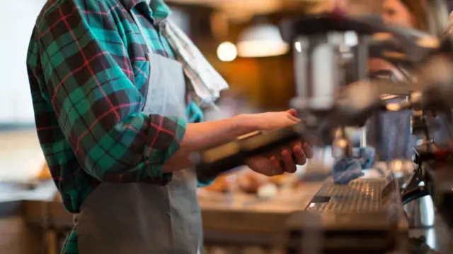 Man working in a coffee shop