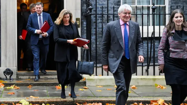 Mel Stride, Penny Mordaunt, Andrew Mitchell and Michelle Donelan walking out of No 10