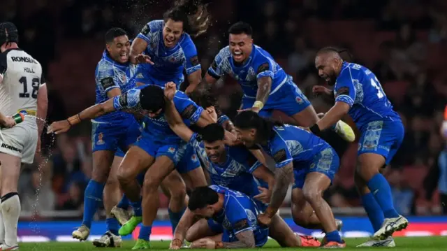 Samoa players celebrate