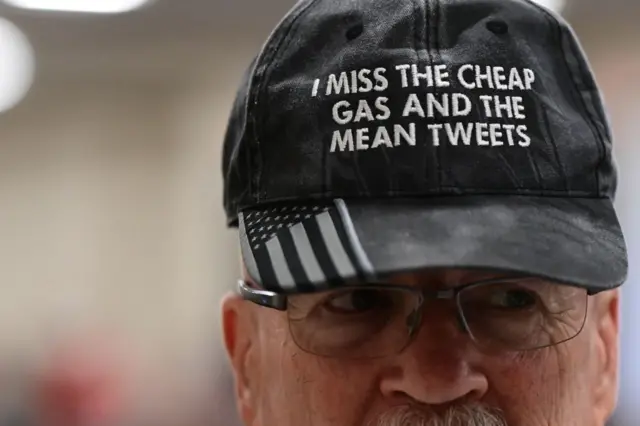 A Pennsylvania voter totes a pro-Trump hat