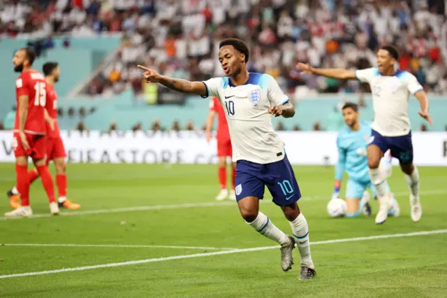 Raheem Sterling celebrates scoring for England