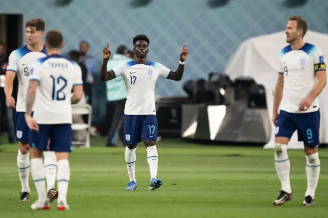 Bukayo Saka celebrates his second for England