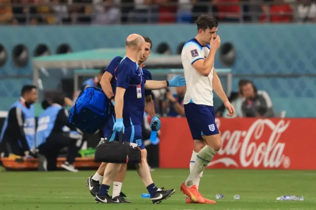 Harry Maguire is helped off