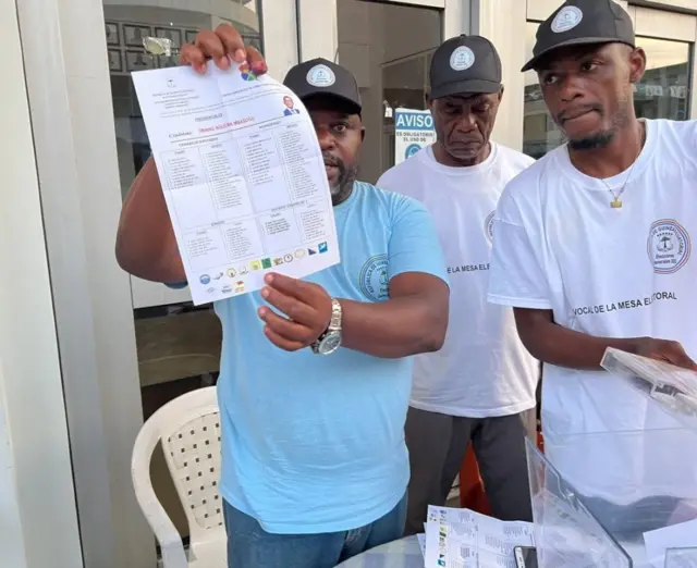 Electoral officials count votes as the voting ends for presidential, legislative elections in Malabo, Equatorial Guinea on November 20, 2022.